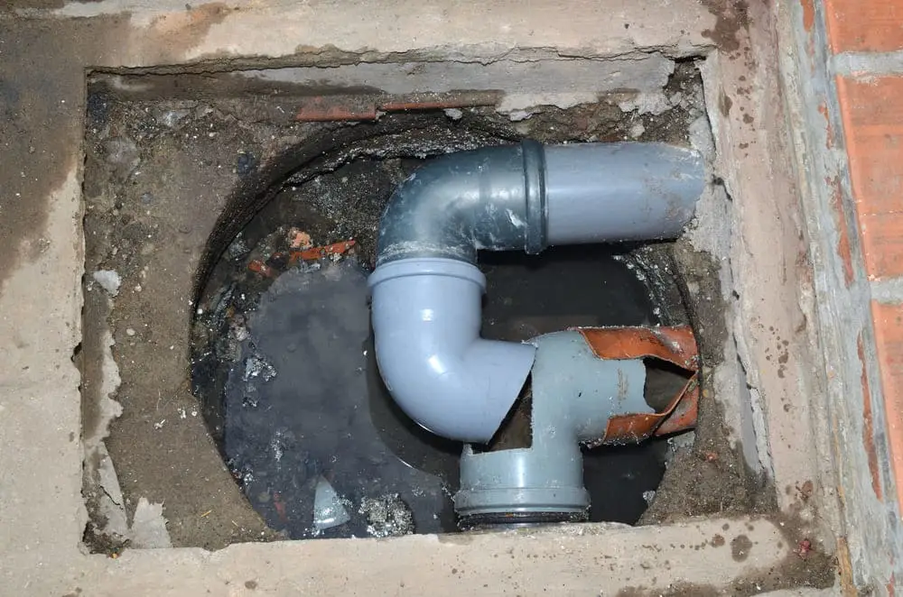 Débouchage Anderlecht Bruxelles Capitale : Conduite d'eau et drainage dans la cour d'une maison privée